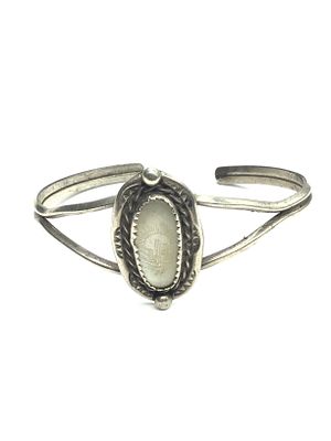 Navajo mother of pearl cuff bracelet. Sterling silver cuff with a carved mother of pearl stone. 