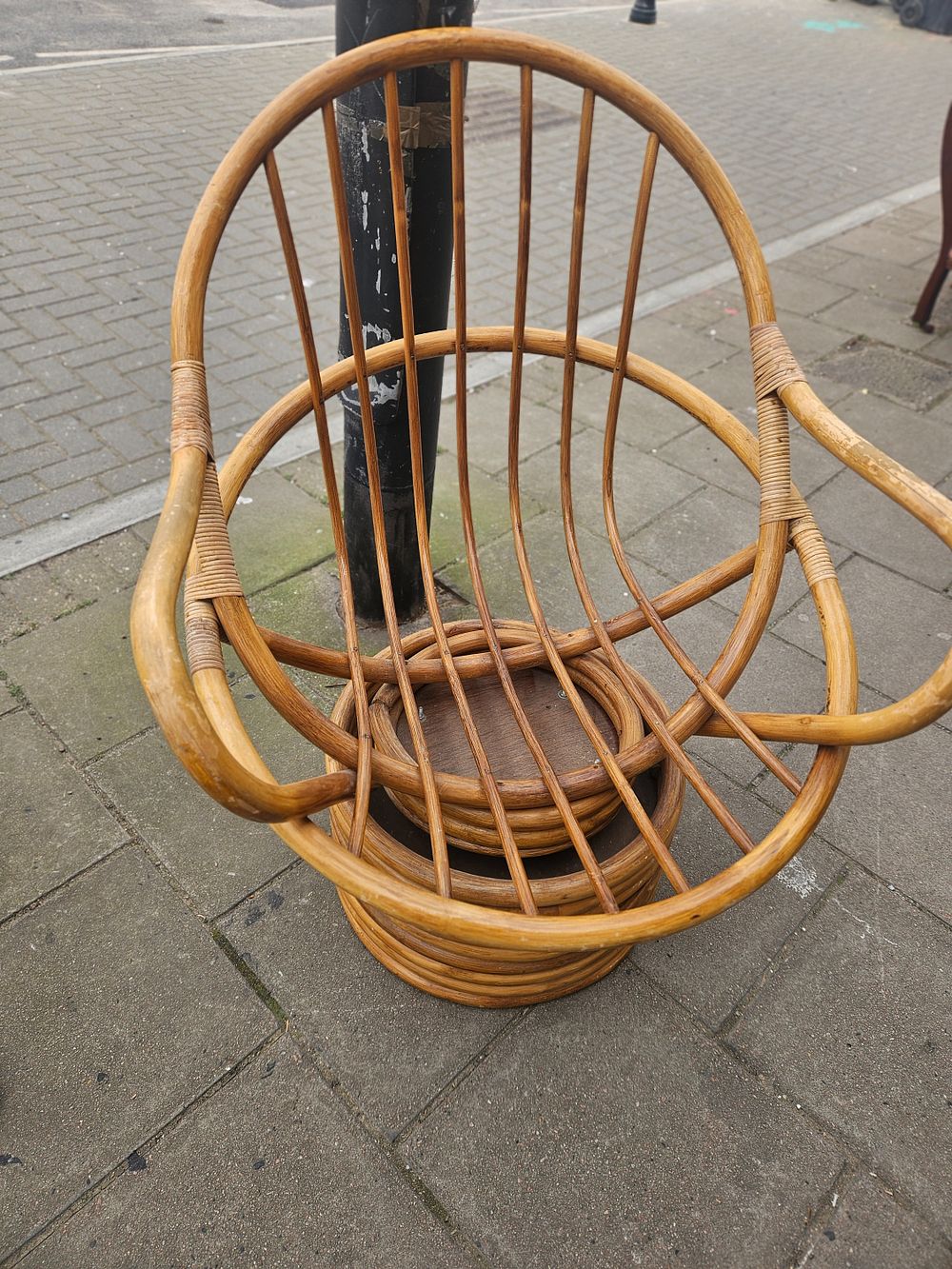 Lot 154 – A Mid-Century Modern Rattan Swivel Lounge Chair in the Manner of Paul Frankl