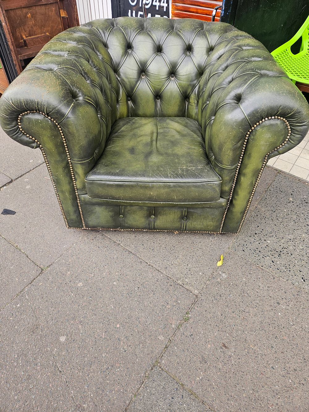 Lot 158 – A Late 20th Century Green Leather Chesterfield Armchair
