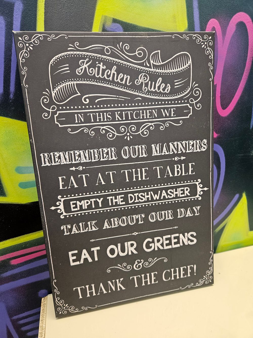 Lot 173 – A Contemporary Chalkboard Style Kitchen Rules Printed Wall Plaque