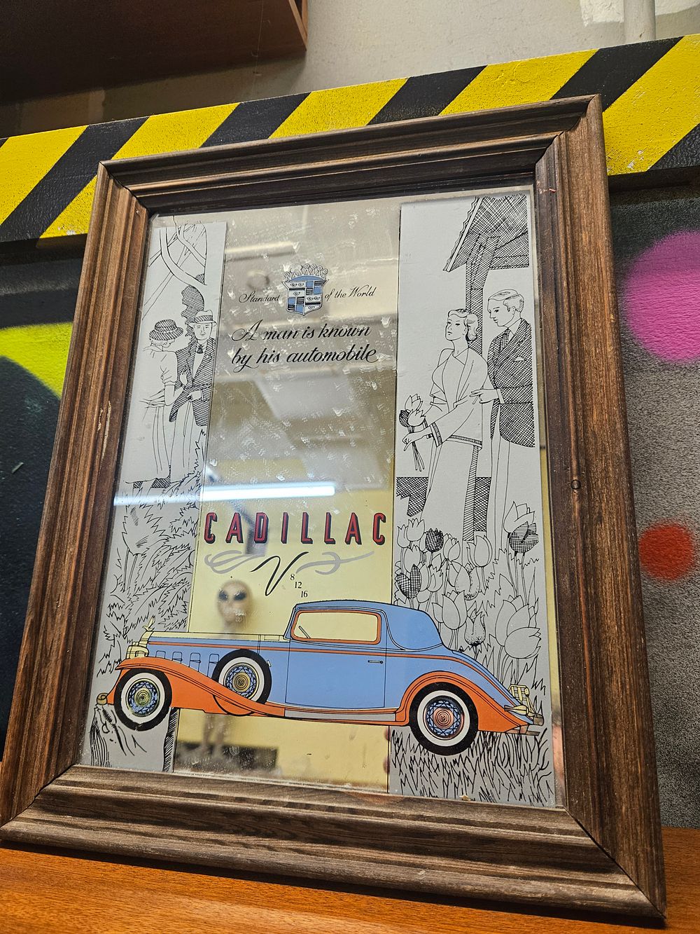 Lot 189 – A Vintage Cadillac Advertising Mirror A Man is Known by his Automobile