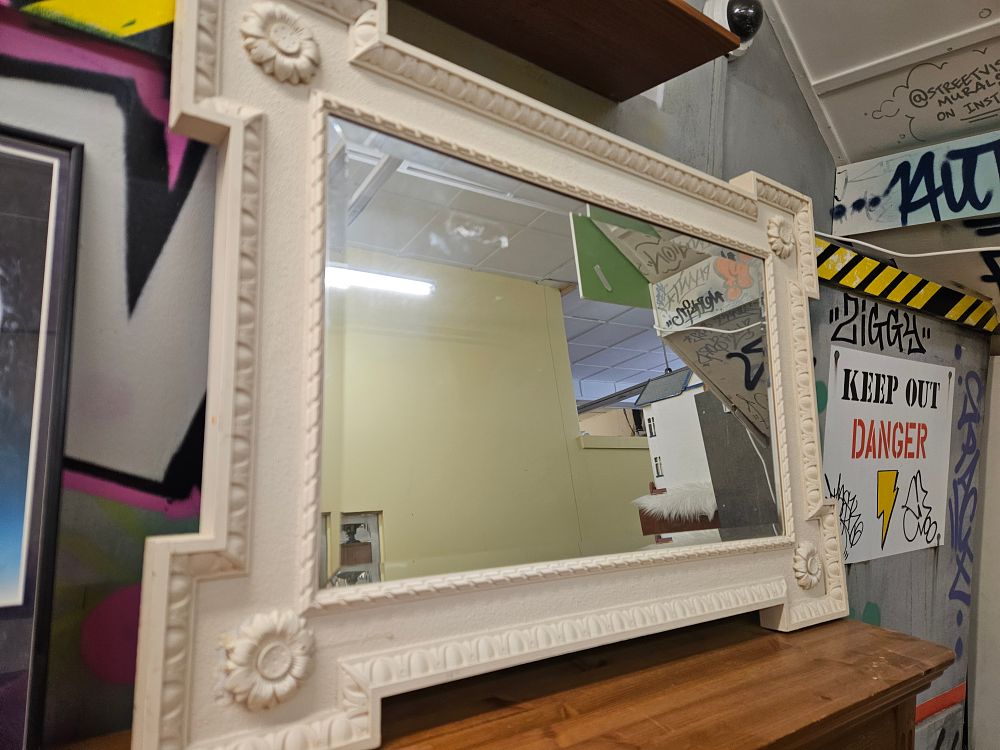 Lot 201 – A late 20th-century Neoclassical style off-white moulded composite wall mirror