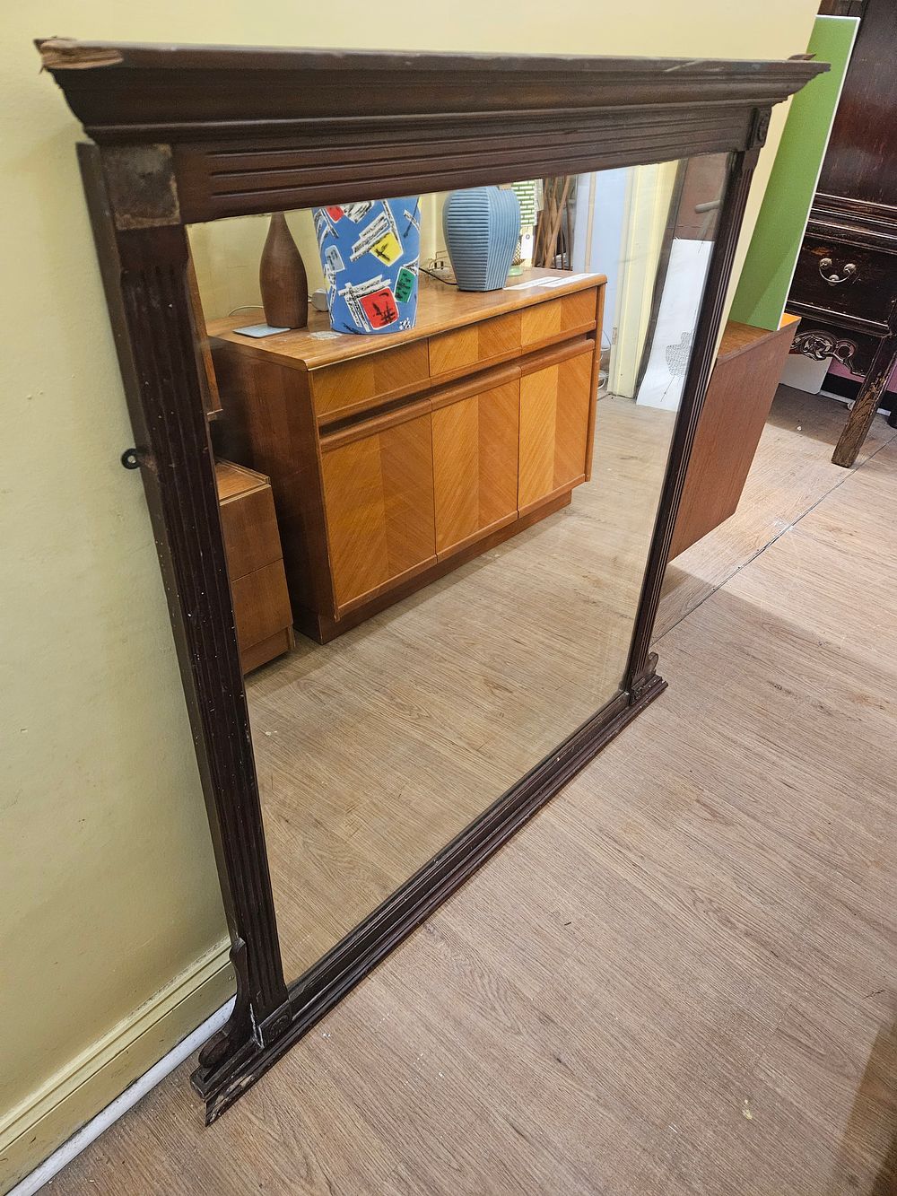 Lot 204 – A late Victorian or Edwardian mahogany overmantel mirror