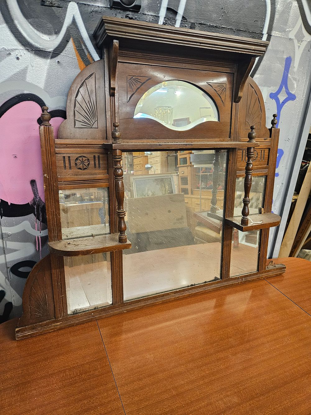 Lot 209 – A late Victorian Aesthetic Movement stained wood overmantel mirror, circa 1890