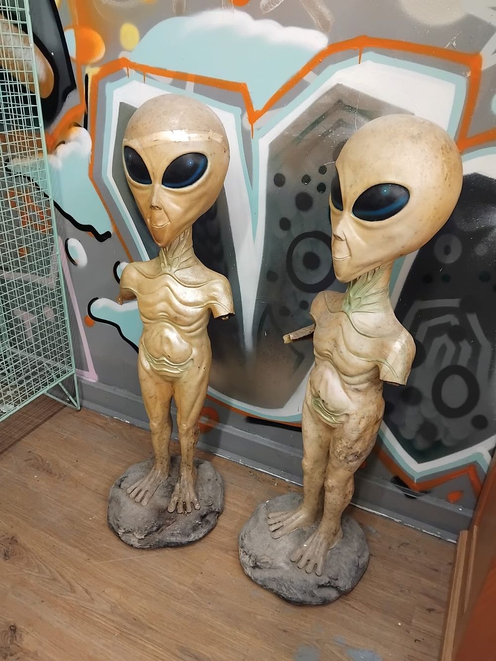 Lot 216 – A Pair of Contemporary Moulded Resin Life-Size Grey Alien Figures
