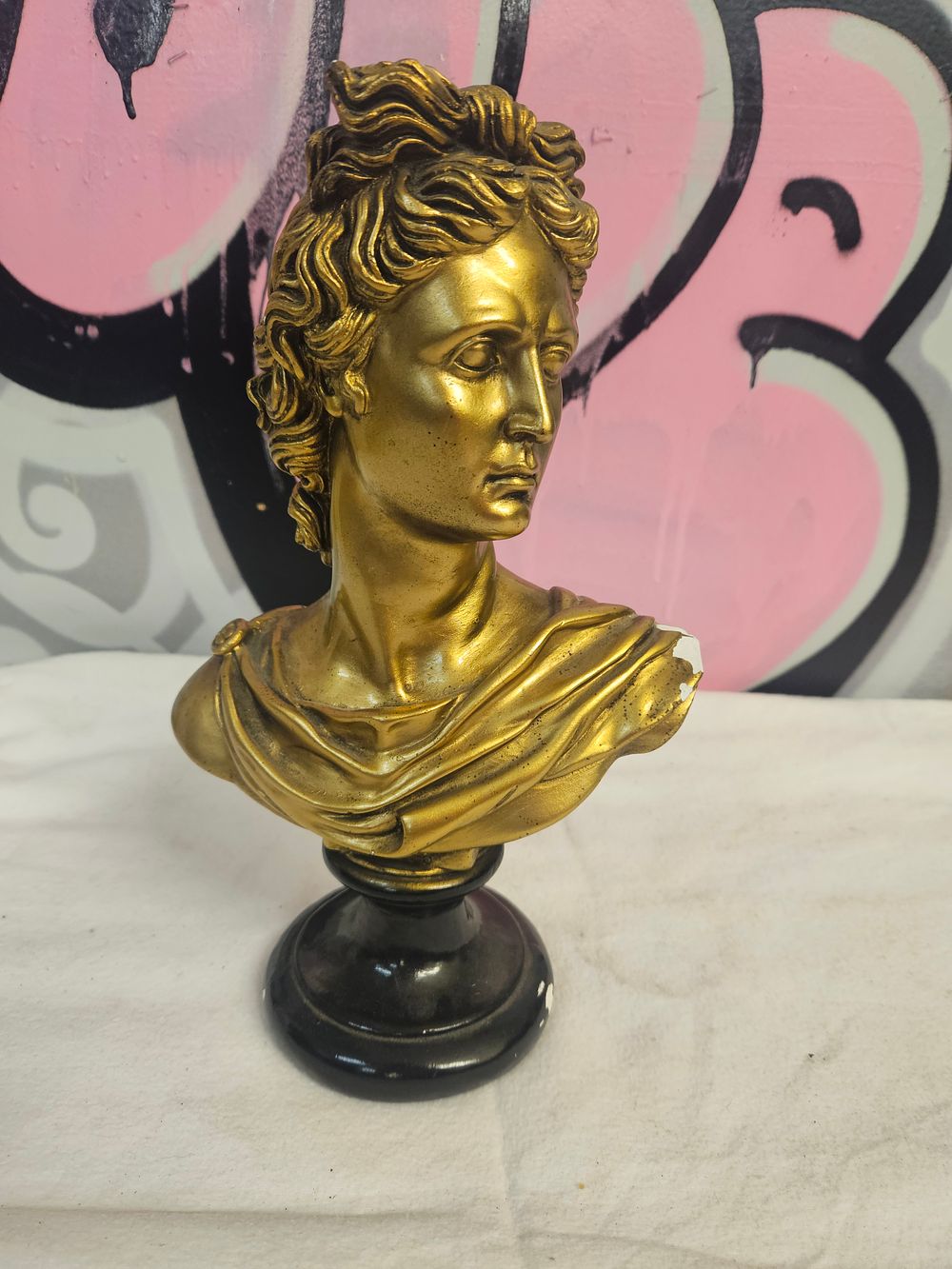 Lot 220 – A Neoclassical Style Gilt Finished Resin Bust of Apollo Belvedere