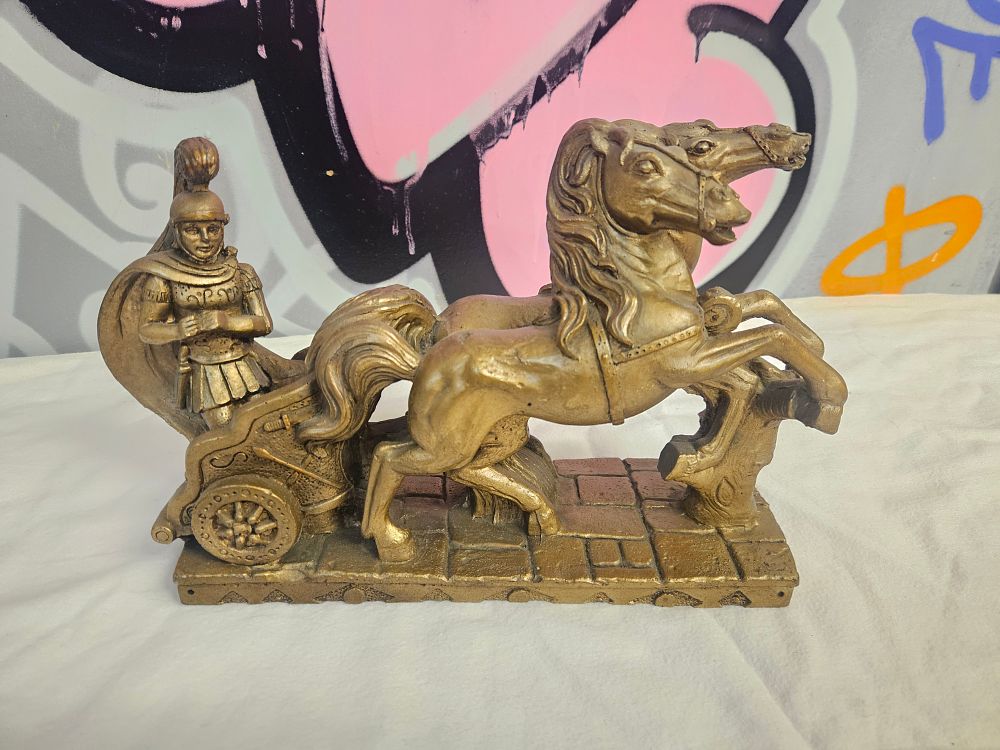 Lot 229 – A Roman Charioteer Sculpture with Gold-Tone Finish