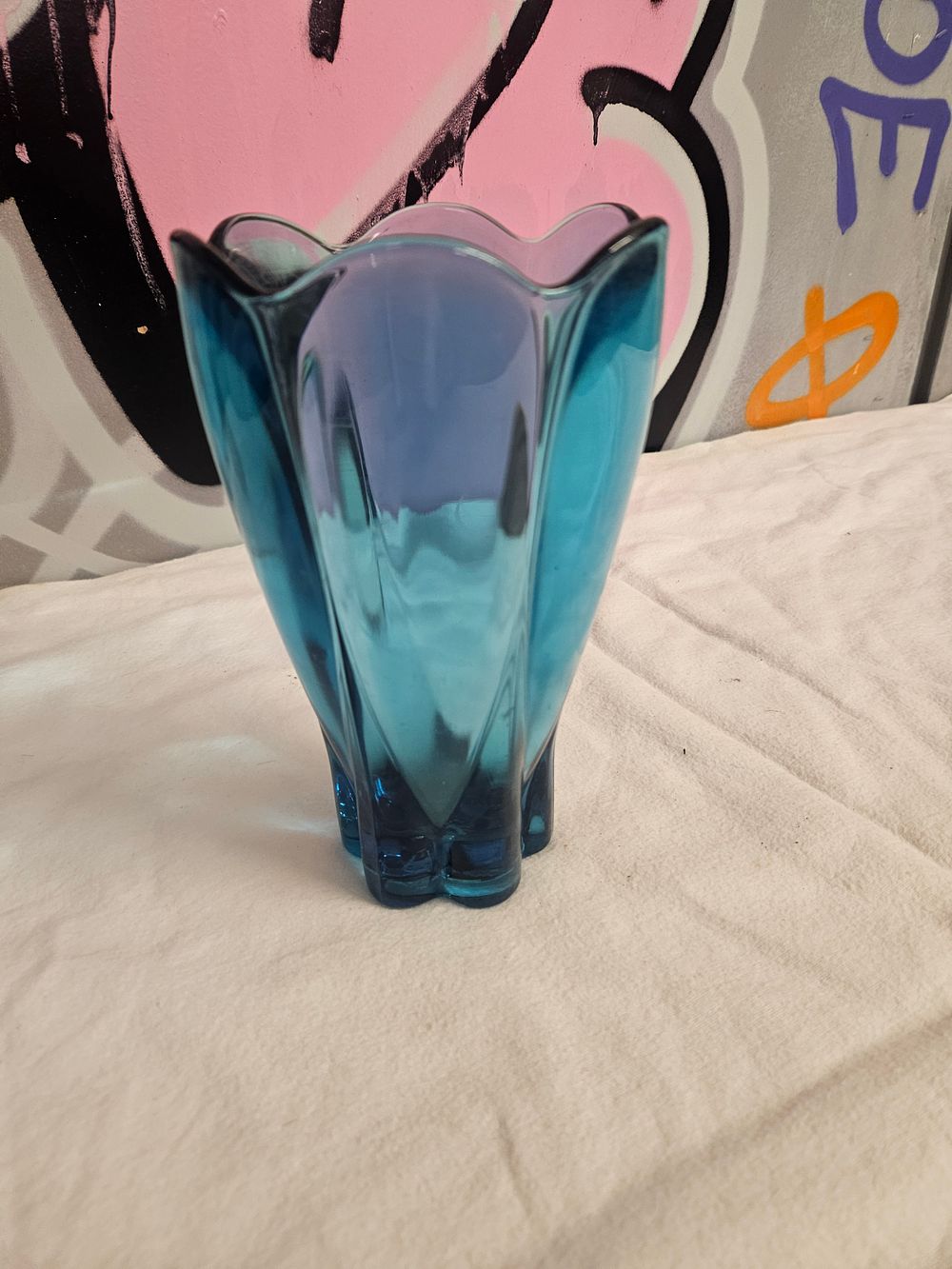 Lot 231 – A mid-century teal blue lobed art glass vase in the style of Whitefriars