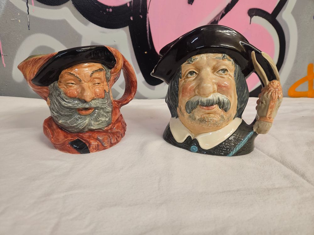 Lot 239 – Two Royal Doulton Large Character Jugs, Falstaff D6287 and Sancho Pança D6456