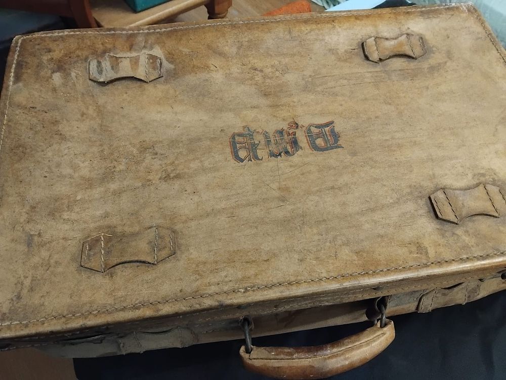 Lot 244 – An Imperial German Leather Officer’s Suitcase with Fraktur Initials, circa 1900-1918