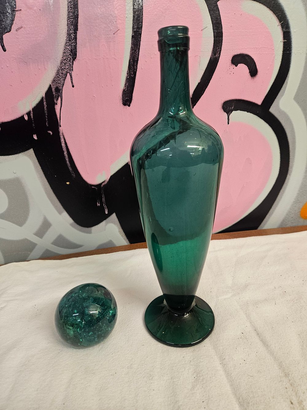 Lot 268 – A mid-century modern style teal green art glass decanter and stopper