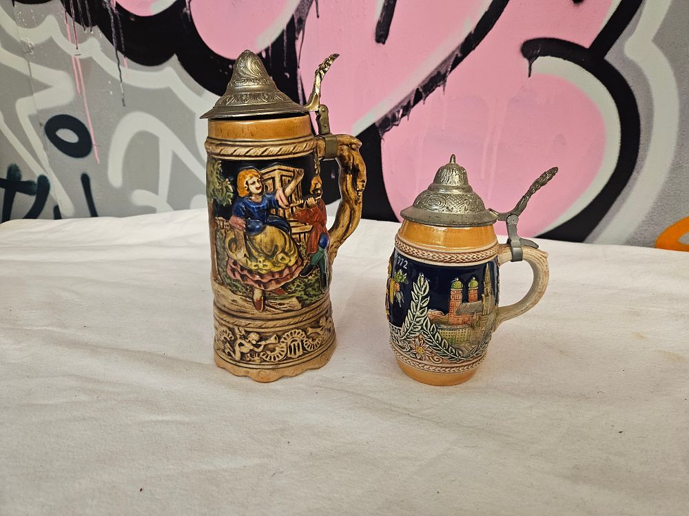 Lot 271 – Two German Lidded Beer Steins including a Musical Example and a 1972 Gerz Commemorative Stein