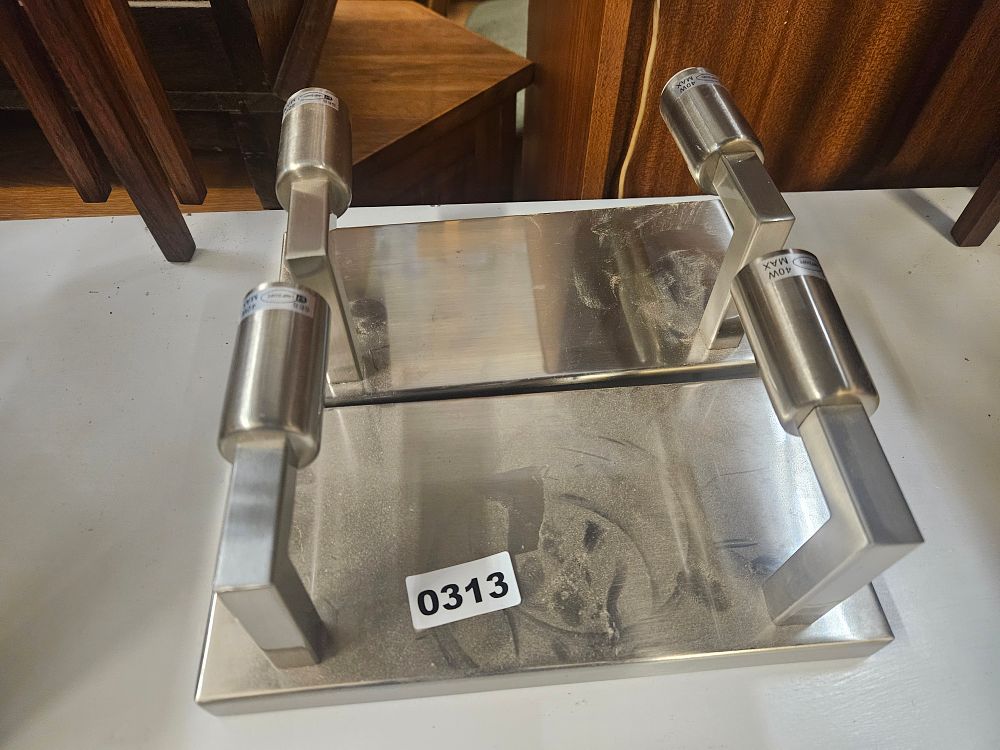 Lot 313 – A pair of contemporary twin-light brushed metal wall sconces