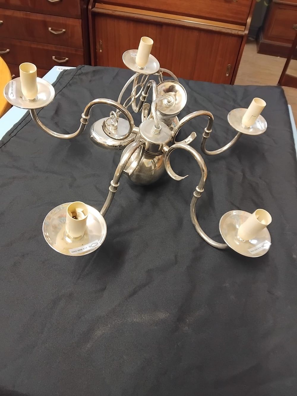 Lot 352 – A modern five-arm chandelier in the Flemish style with a polished chrome-effect finish