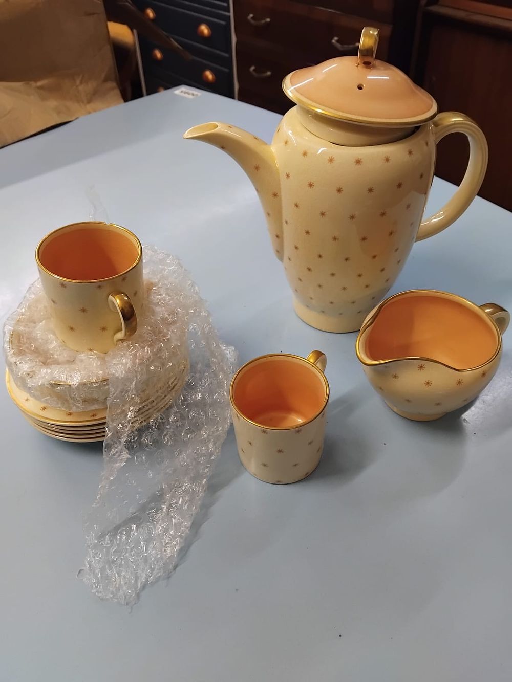 Lot 361 – A Susie Cooper Falcon shape earthenware coffee service pattern 1687