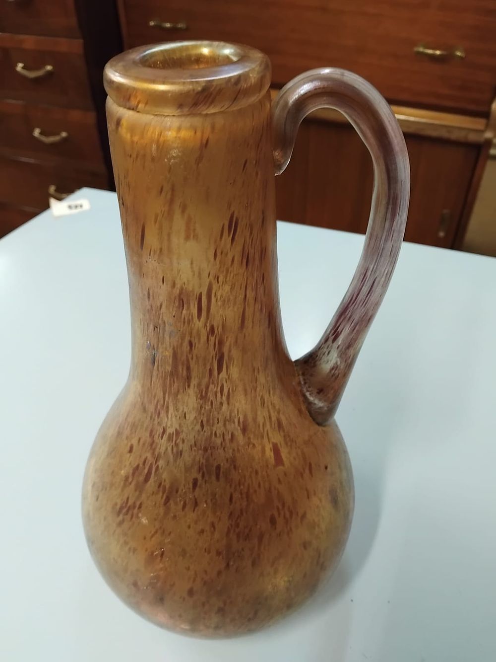 Lot 373 – A late 20th-century iridescent studio art glass ewer