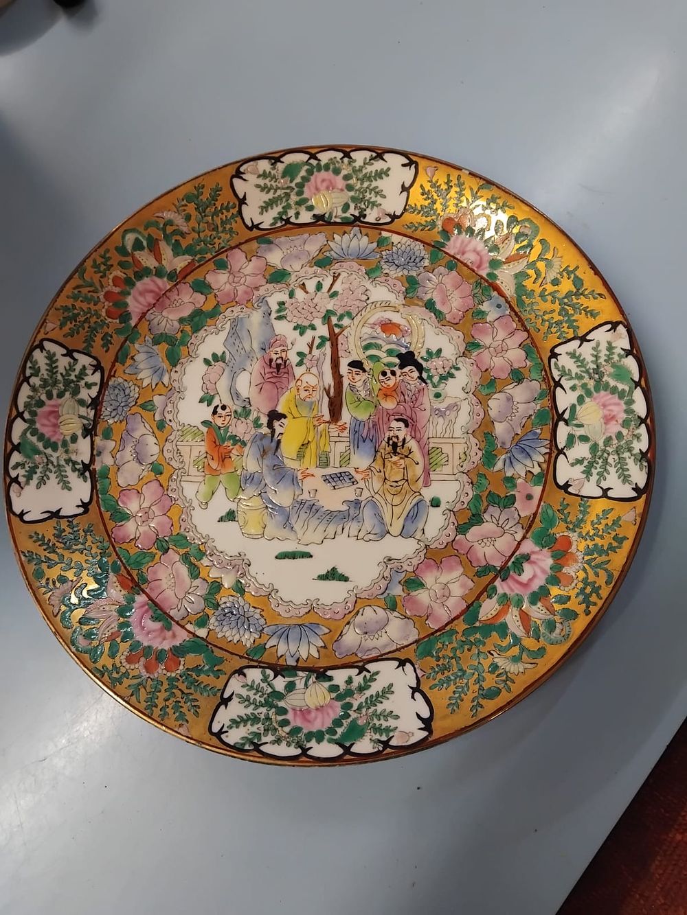 Lot 401 – A Chinese Famille Rose Medallion Porcelain Plate with Apocryphal Qianlong Mark