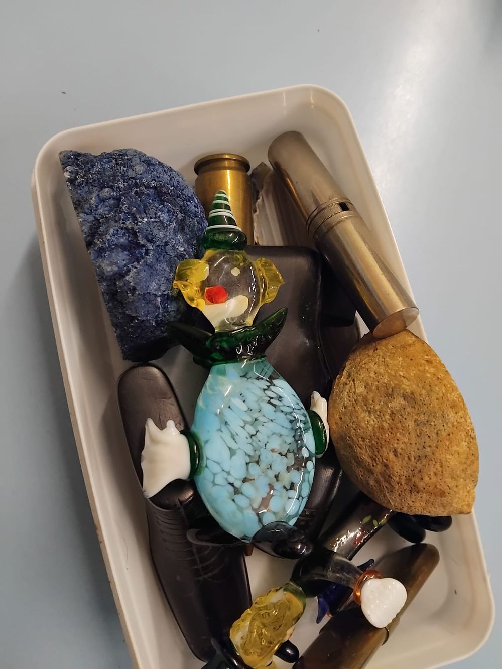 Lot 409 – An Assortment of Murano Style Glass Clowns, Mineral Specimens, and Miscellaneous Collectibles