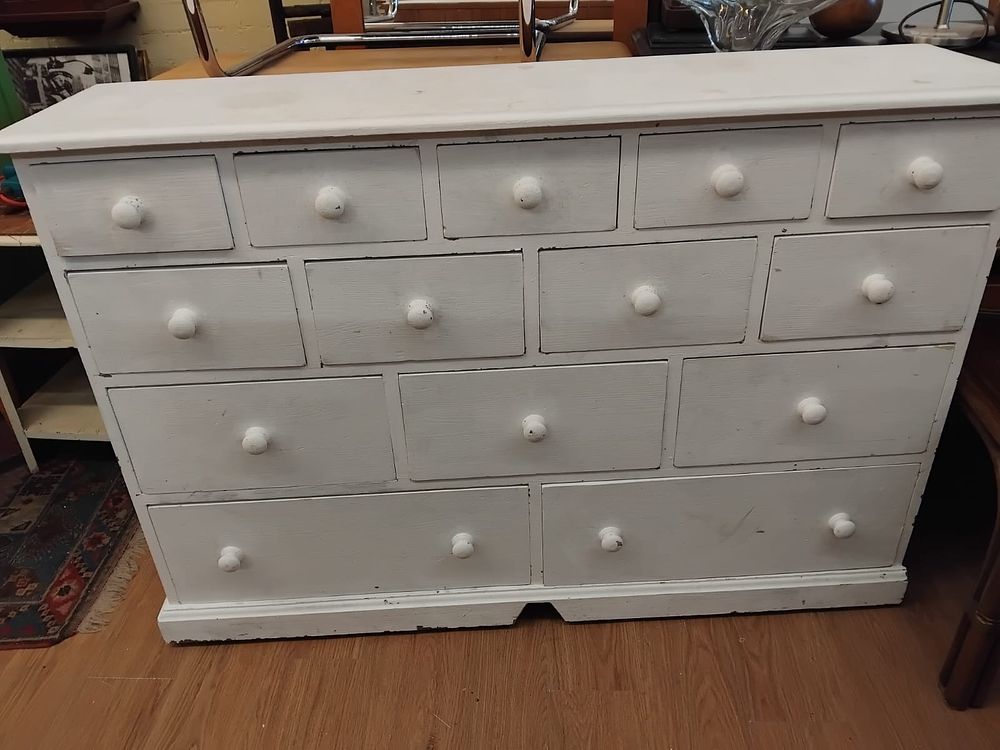 Lot 154 – A late 20th century white painted pine apothecary style chest of fourteen drawers
