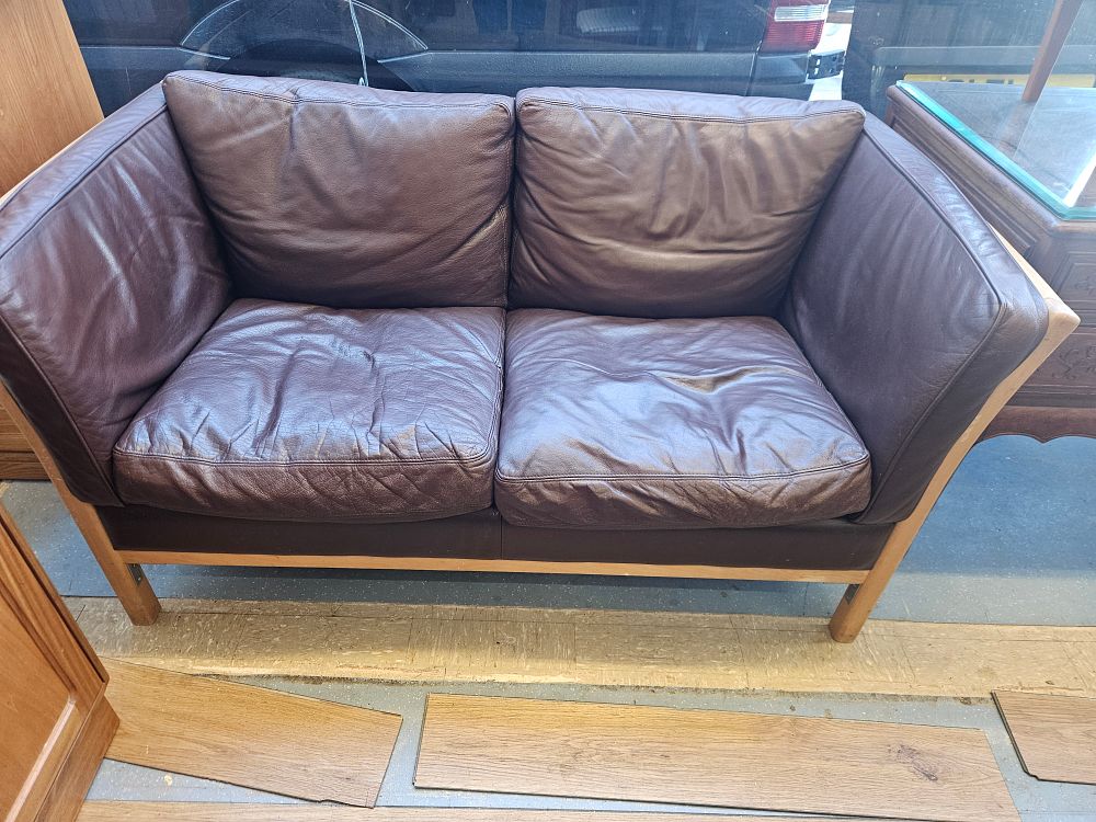 Lot 168 – A Danish Stouby Two-Seater Leather Sofa