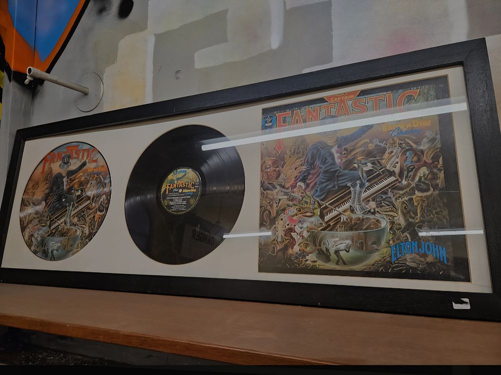 Lot 202 – Elton John Captain Fantastic and the Brown Dirt Cowboy Framed Record Display including Picture Disc and LP