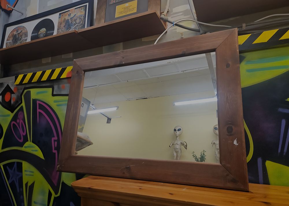 Lot 203 – A Large Contemporary Rustic Stained Wood Framed Wall Mirror