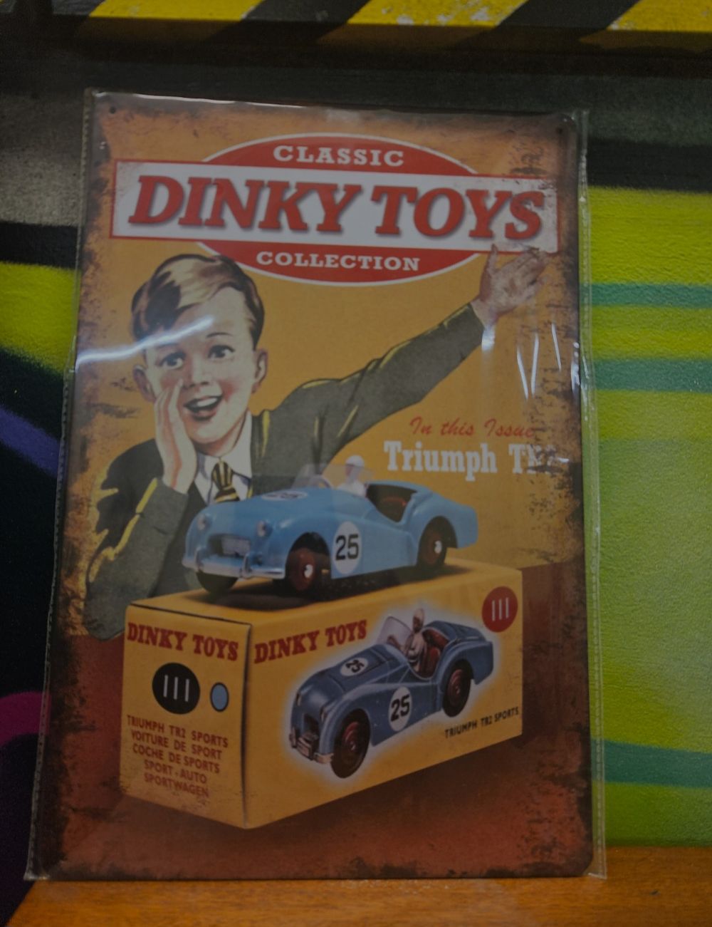 Lot 235 – Contemporary Dinky Toys Promotional Metal Advertising Sign for Triumph TR2
