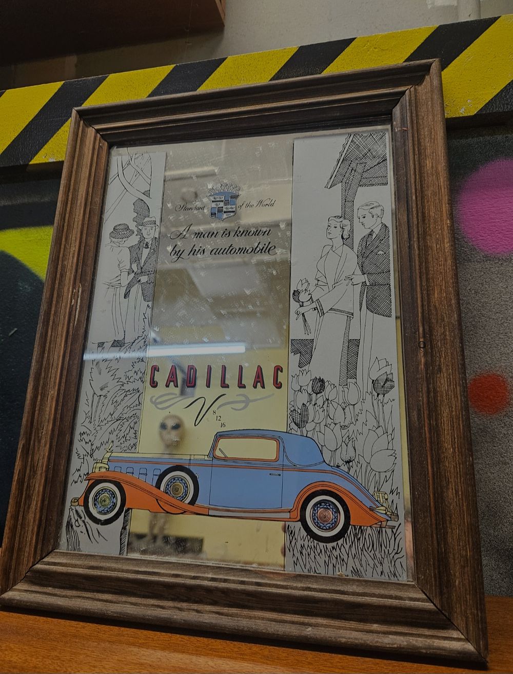 Lot 241 – A Cadillac Standard of the World Decorative Advertising Mirror