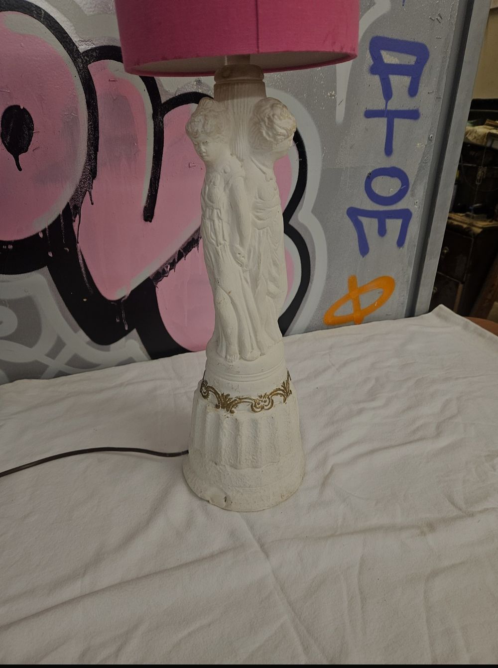 Lot 261 – A mid-20th-century classical-style figural table lamp