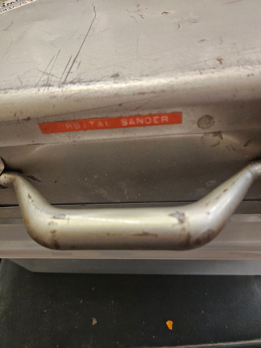 Lot 264b – A Pair of Electric Power Sanders in a Metal Carry Case