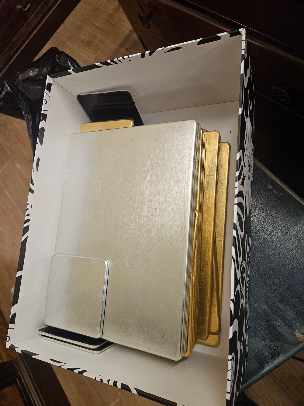 Lot 267b – A Collection of Modern Gold and Silver Toned Table Mats and Coasters