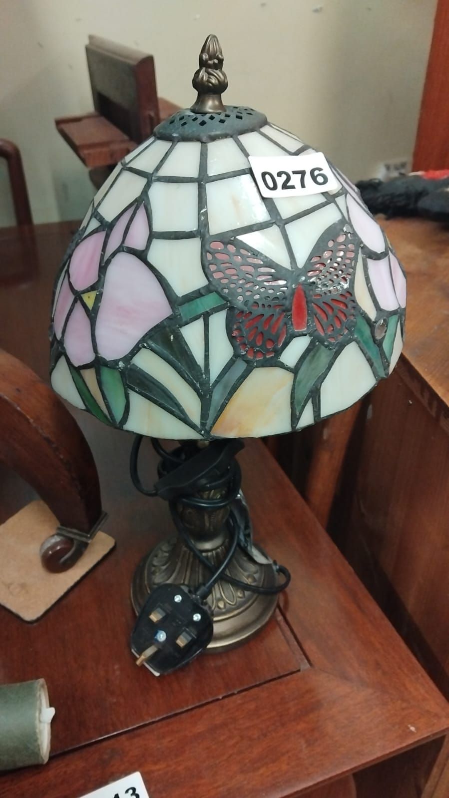 Lot 276 – A Tiffany-style Butterfly and Floral Stained Glass Table Lamp af