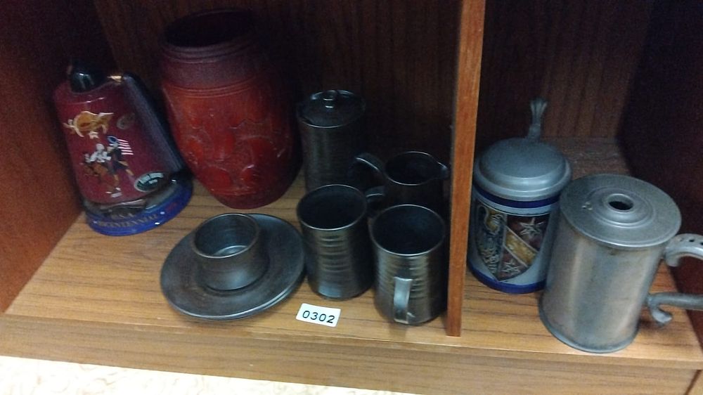 Lot 302 – An Assortment of Decorative Ceramic and Metal Drinking Vessels and Vases