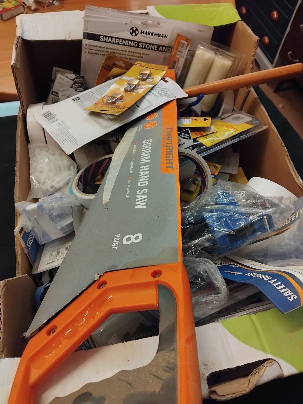 Lot 303 – A Collection of Mixed Hardware, Hand Tools, and DIY Consumables including Craftright Hand Saw and Marksman Sharpening Stone