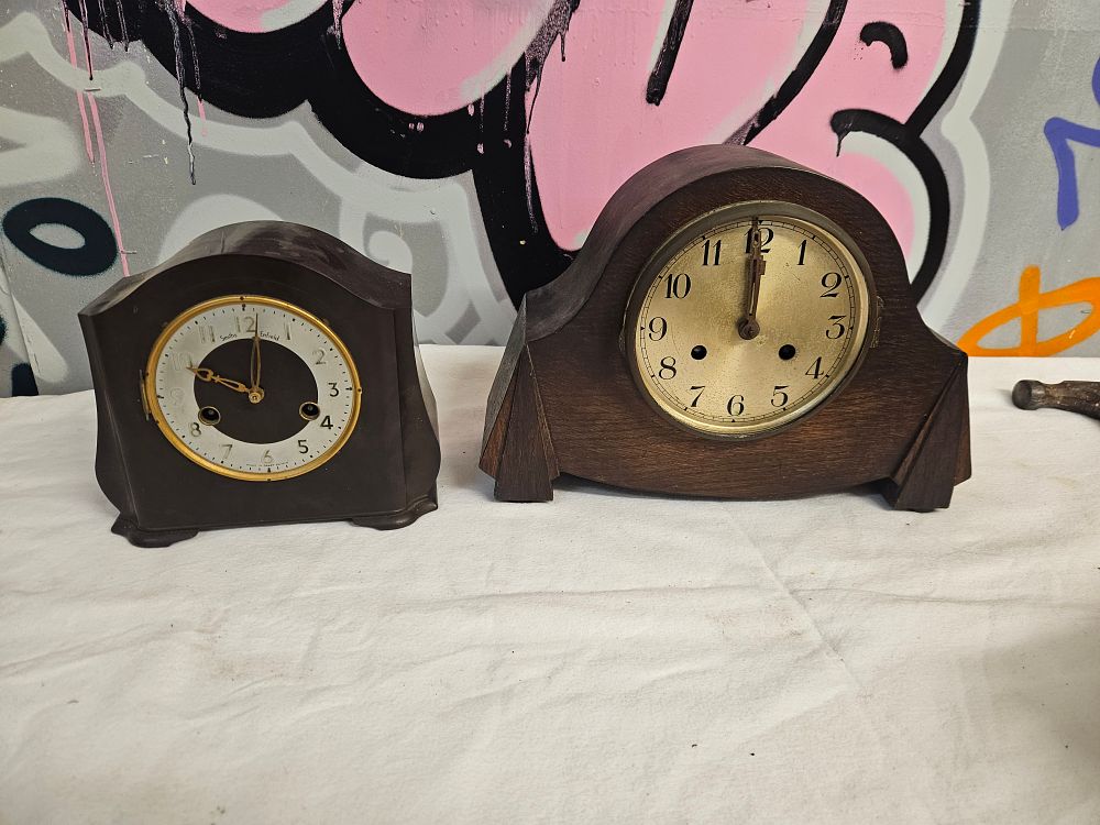 Lot 323 – A Smiths Enfield Bakelite mantel clock and an Art Deco style oak cased mantel clock