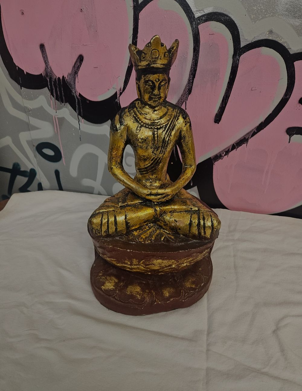 Lot 326 – A 20th Century Thai Style Gilt and Painted Composition Figure of a Crowned Buddha