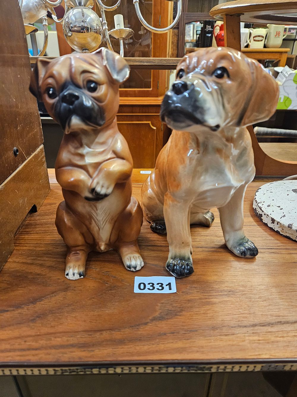 Lot 331 – A Pair of Japanese Glazed Ceramic Boxer Dog Figurines