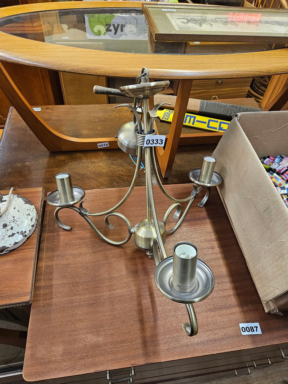 Lot 333 – An antiqued brass-effect three-arm ceiling light fitting