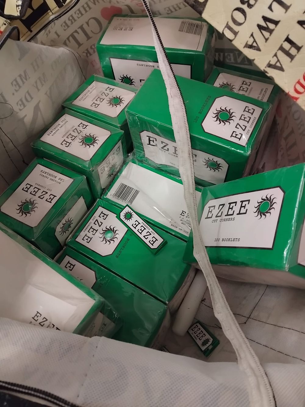 Lot 337 – A Collection of Ezee Green Cut Corners Cigarette Rolling Papers in Bulk Display Boxes