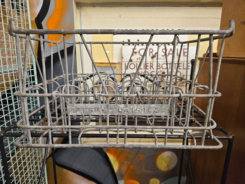 Lot 339 – A Vintage Terry’s Dairies Galvanised Steel Wire Milk Bottle Crate