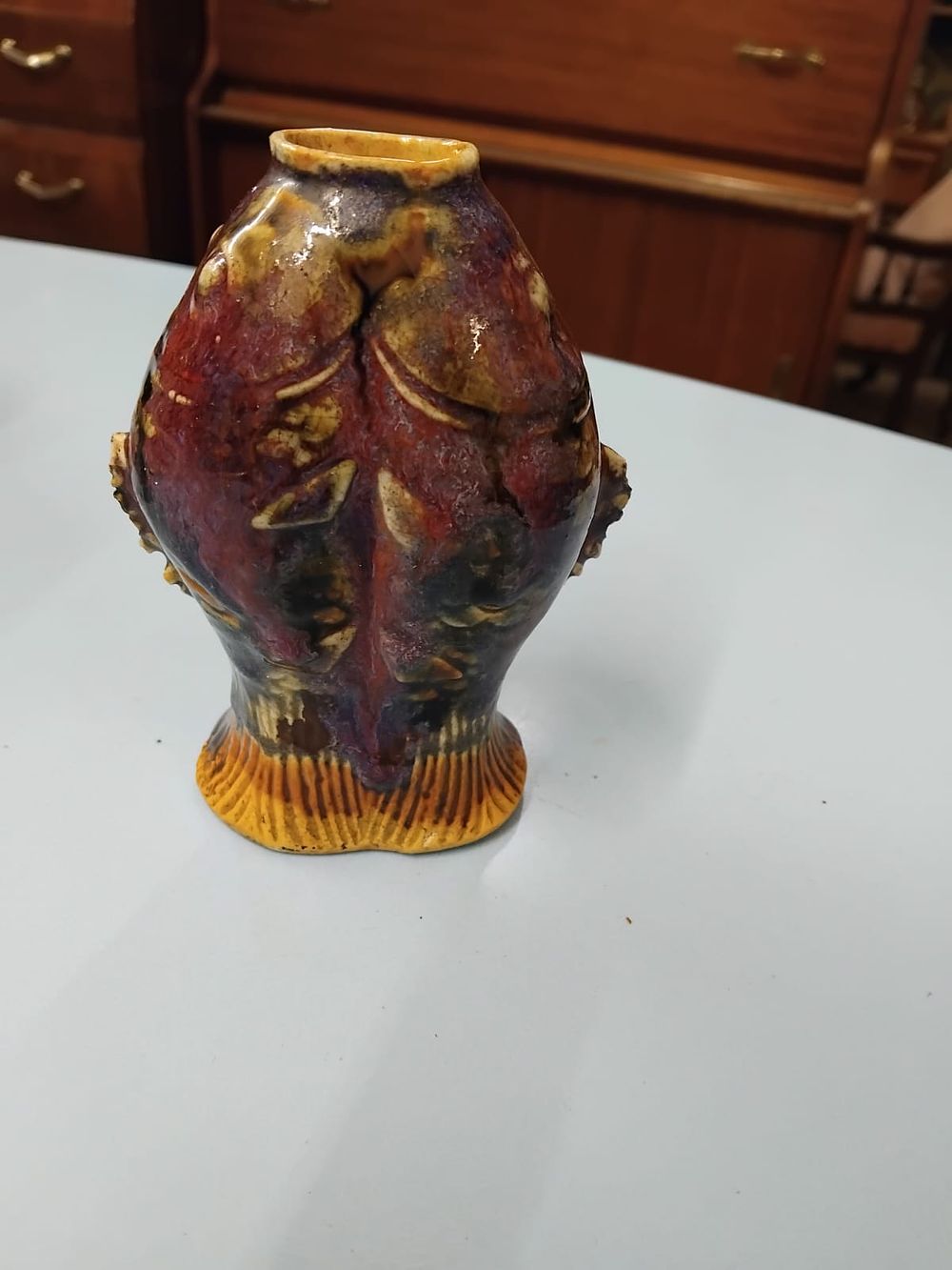 Lot 349 – A late 19th or early 20th-century figural twin-fish earthenware vase in the style of European art pottery