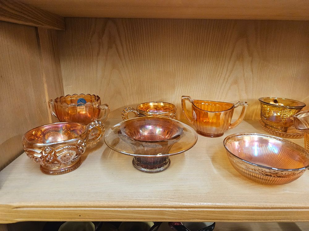 Lot 371 – An Assortment of approximately thirteen pieces of Marigold Carnival Glass Tableware