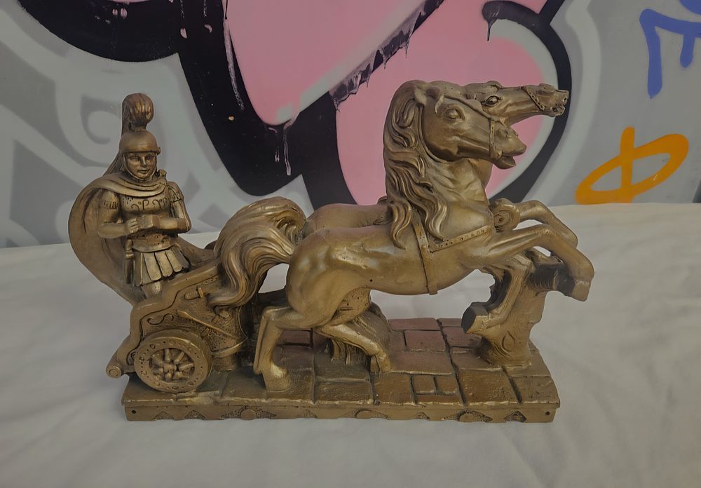 Lot 396 – A Mid-20th Century Neoclassical Style Gilt Composite Sculpture of a Roman Charioteer