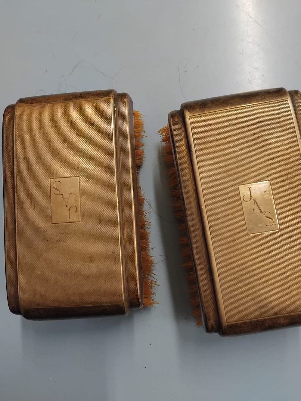 Lot 424 – A Pair of Vintage Art Deco Engine-Turned Military Hairbrushes