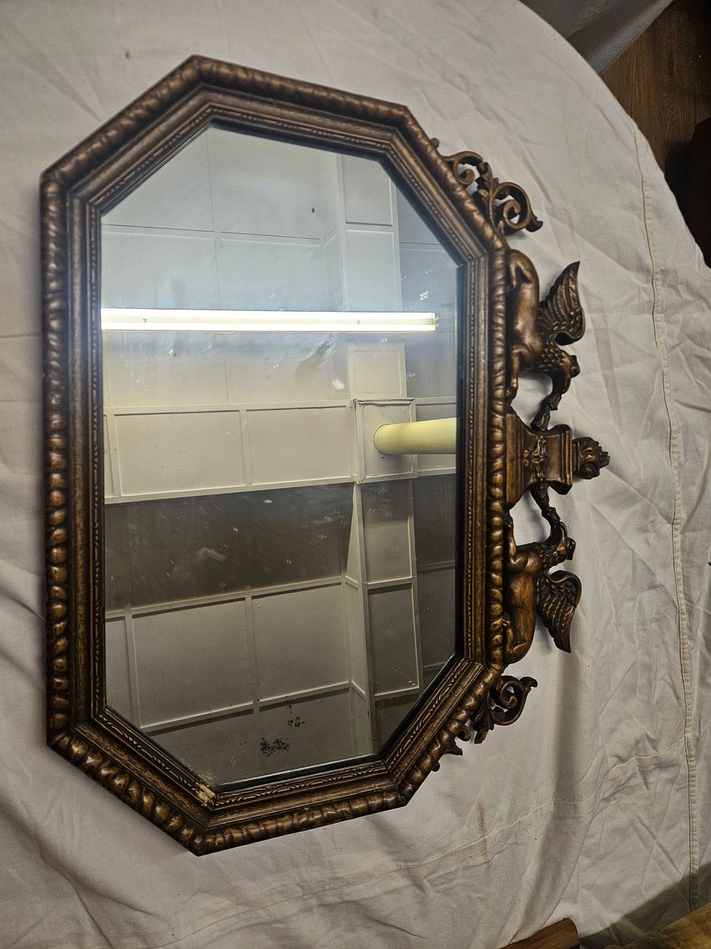 Lot 194 – Regency Style Octagonal Wall Mirror with Gryphon and Urn Cresting