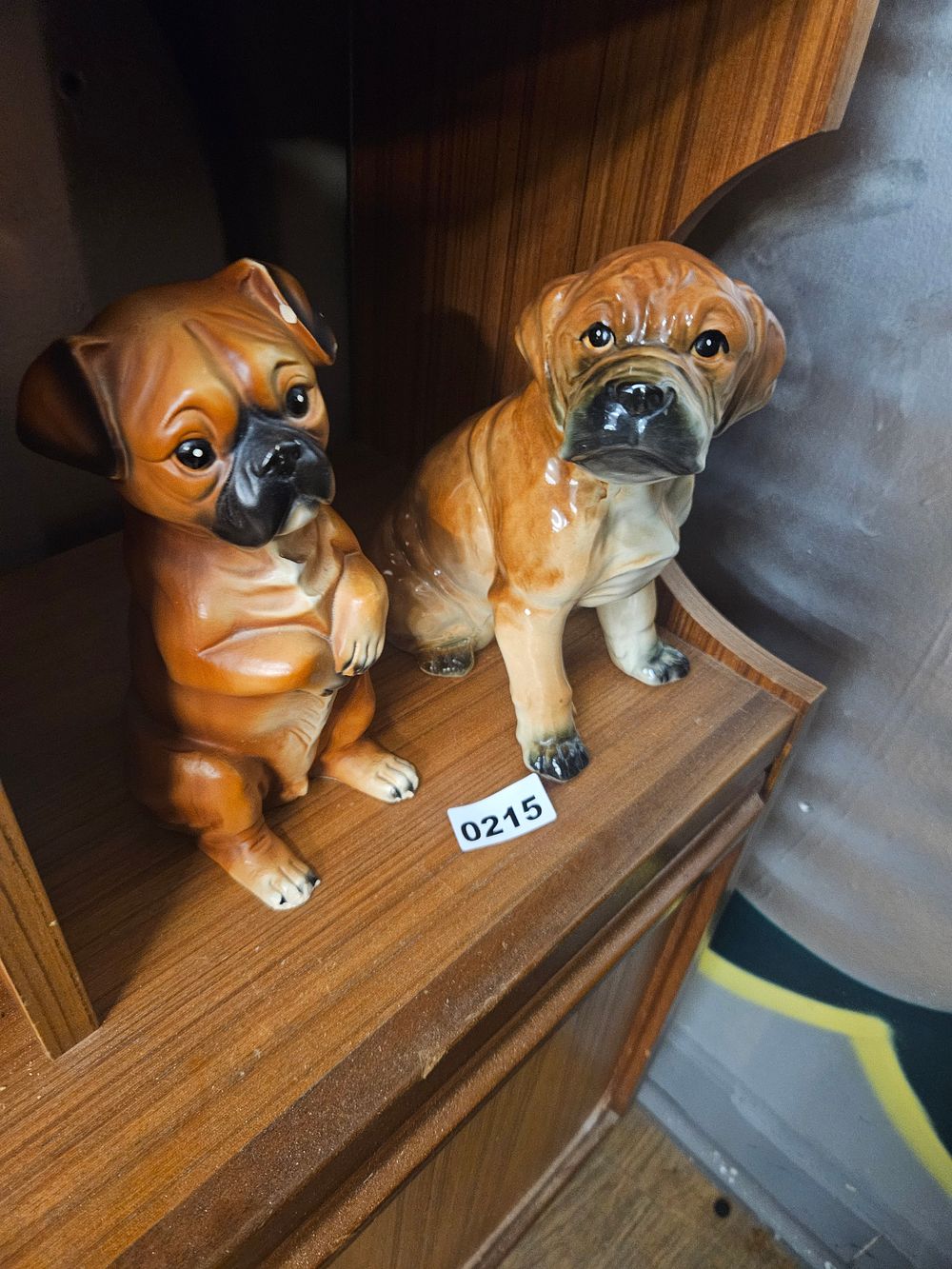 Lot 215 – A Pair of Mid-20th Century Glazed Ceramic Boxer Dog Figurines