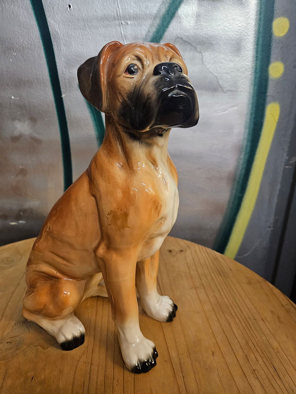 Lot 222 – A Vintage Glazed Ceramic Figurine of a Seated Boxer Dog