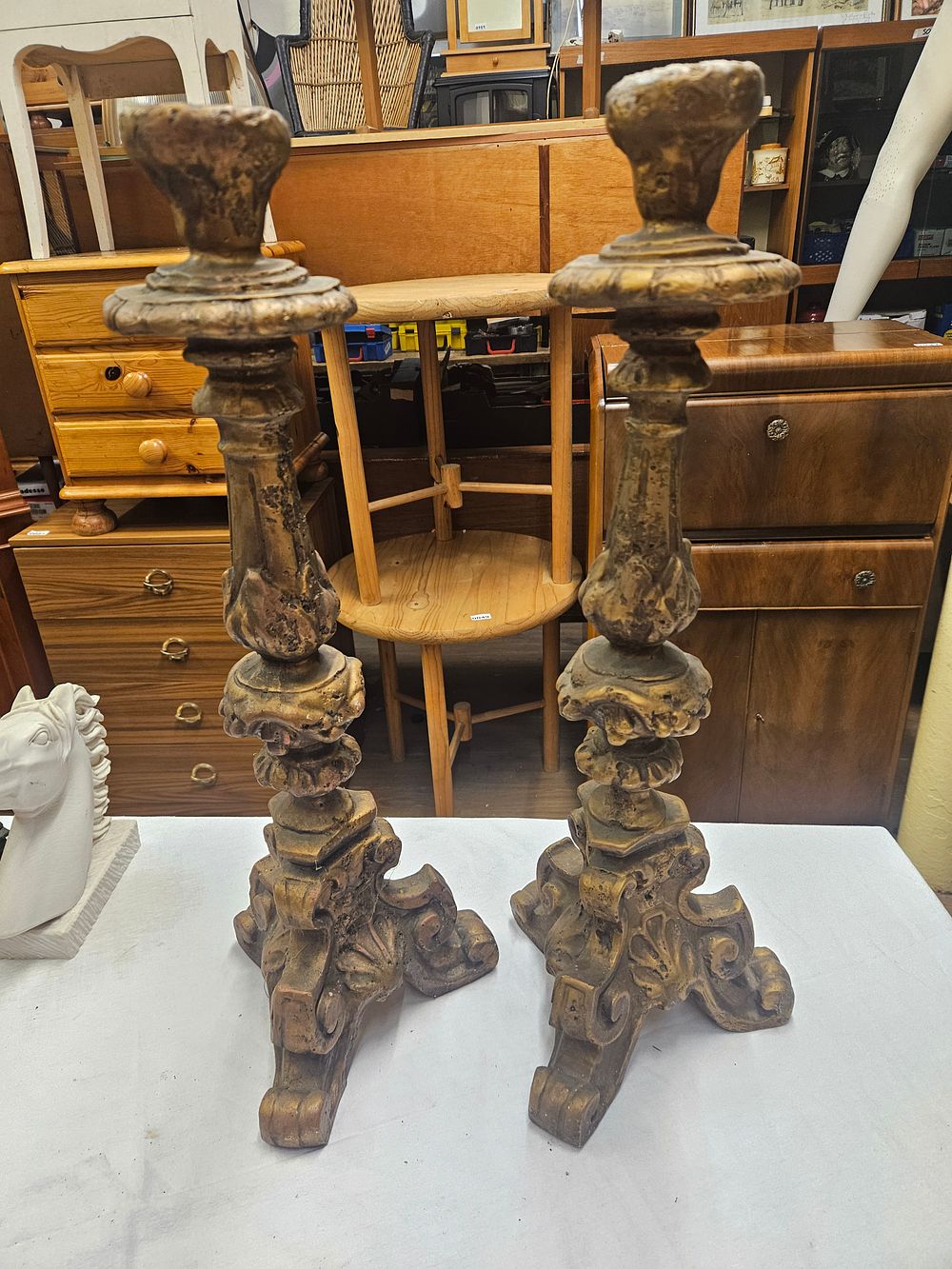 Lot 297 – A Pair of Large Continental Baroque Style Giltwood Candlesticks