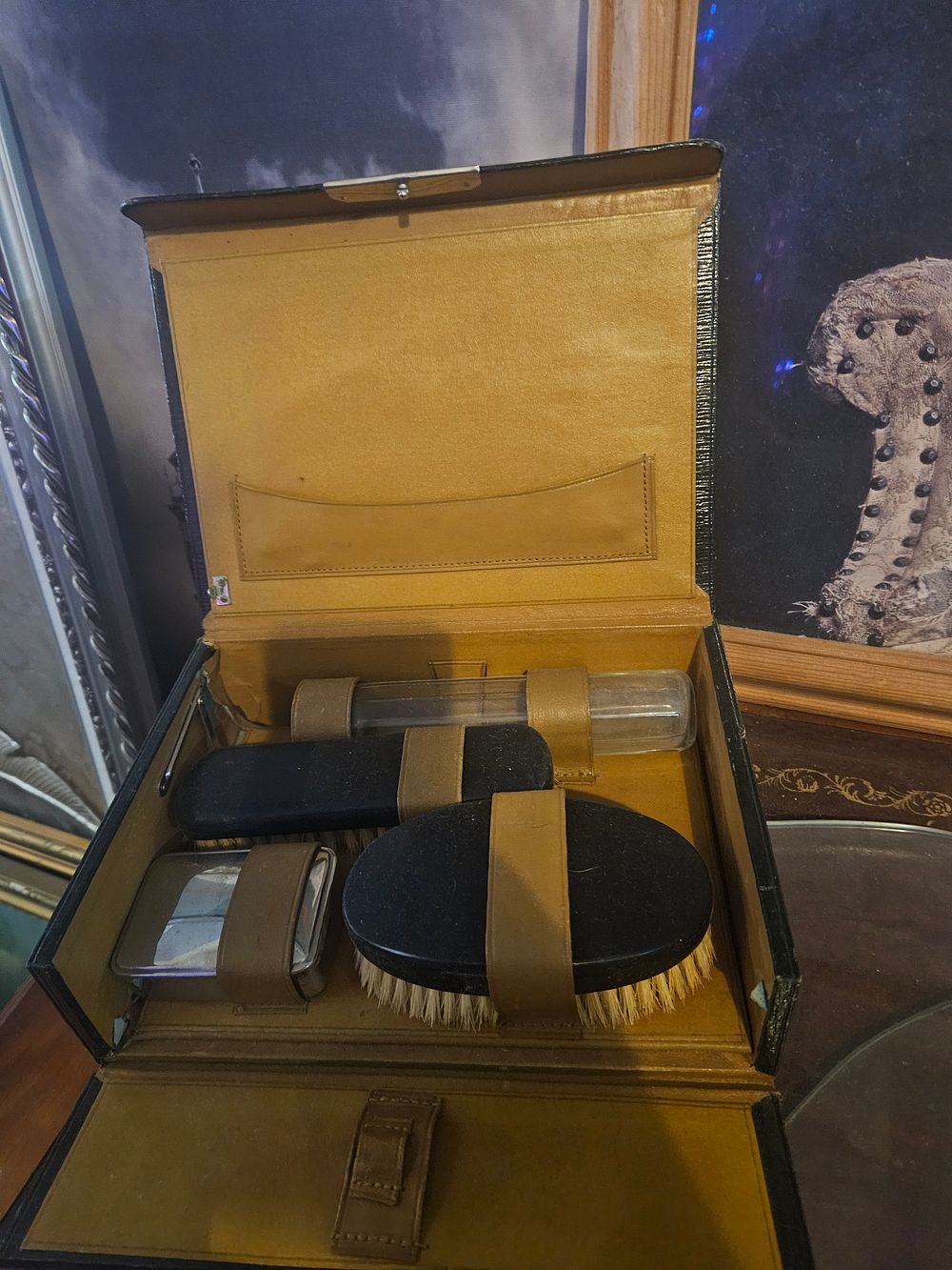 Lot 300i – A mid-20th-century leather-cased travel grooming and valet set