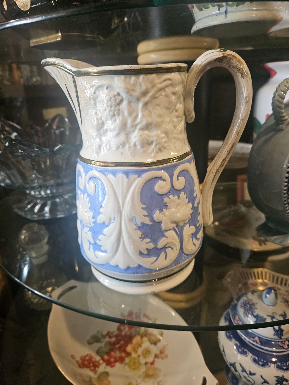 Lot 300q – A Victorian Relief-Moulded Blue and White Stoneware Jug